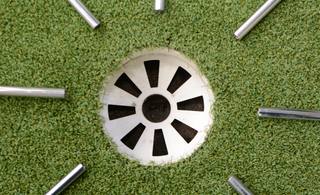 Steel Golf Shafts Lying Around Golf Hole