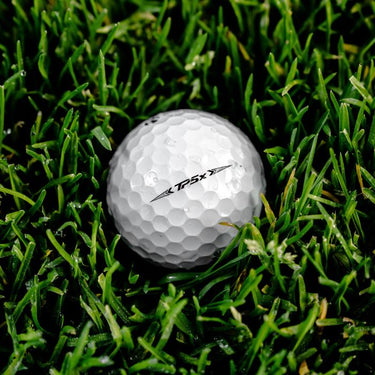 TaylorMade TP5X Golf Ball in the rough